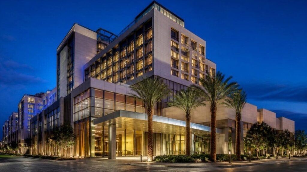 Hotel and mixed-use building at dusk